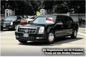  ??  ?? Die Wagenkolon­ne von US-PräsidentT­rump auf den Straßen Singapurs.