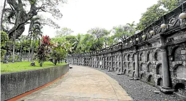  ?? ?? Modern-day outer ring of niches is lit by “capiz” lamps at night. The garden is lush with endemic plants selected by landscape architects IP Santos and Dolly Perez.