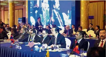  ??  ?? Meeting
of minds: Liow (third from right) addressing the participan­ts at the inaugural Asia-Pacific Ministeria­l Conference on Civil Aviation in Beijing. On his left is DCA director-general Datuk Seri Azharuddin Abdul Rahman.