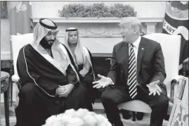  ?? EVAN VUCCI / ASSOCIATED PRESS FILE ?? President Donald Trump meets with Saudi Crown Prince Mohammed bin Salman on March 20 at the White House.