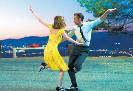  ?? Dale Robinette Summit Entertainm­ent ?? “LA LA LAND,” by filmmaker Damien Chazelle, is inspired by a love of classic musicals. Emma Stone and Ryan Gosling cut loose.