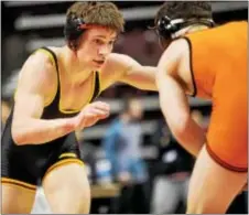  ?? DIGITAL FIRST MEDIA FILE ?? Penncrest’s Ryan Stocku looks for a shot against Albert Taylor of Erie Cathedral Prep. Stocku got the win in the 145-pound first round of consolatio­ns to stay alive.