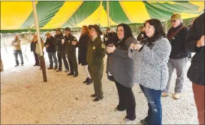  ?? Flip Putthoff/NWA Democrat-Gazette ?? Arkansas State Parks staff and guests hear remarks at the Devils Racetrack dedication.