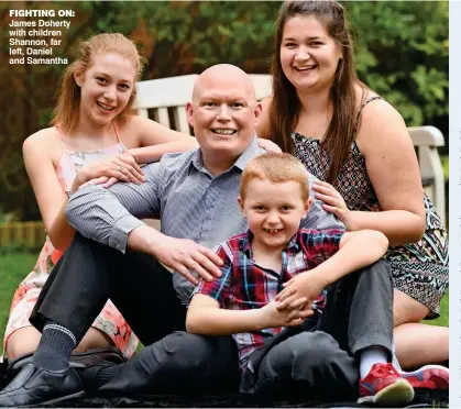  ?? ?? FIGHTING ON: James Doherty with children Shannon, far left, Daniel and Samantha