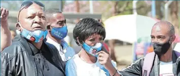  ?? GALLO IMAGES/FANI MAHUNTSI ?? Kenny Kunene with Bridget Harris at the Protea magistrate’s court during bail applicatio­n of cops accused of murdering her son Nateniël Julies, 16.