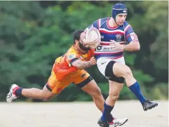  ??  ?? CHARGE: Barron-Trinity's Alphonse Gima puts in a storming run.