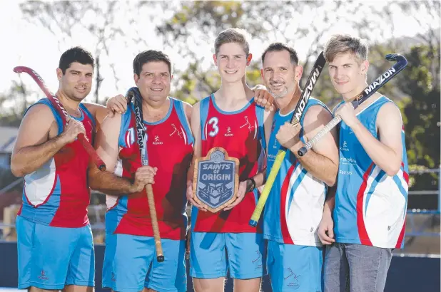  ??  ?? BIGGEST BATTLE: Two Cairns Hockey Associatio­n clubs are playing for their own Saints of Origin shield this weekend. (From left) Adam Catalano and his father Joe Catalano, Ethan Andrejic with his father Maurice Andrejic and brother Lachlan. Picture:...