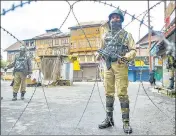  ?? PTI FILE ?? Security personnel stand guard during restrictio­ns in Srinagar on October 18, 2019.