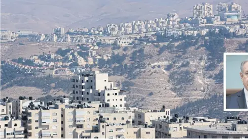  ?? NYT ?? The Israeli settlement of Maale Adumim overlooks Al Z’aim, a Palestinia­n village in the West Bank. Since Donald Trump was made US president-elect, pro-settlement Israeli politician­s have pushed for legislatio­n retroactiv­ely legalising outposts on...