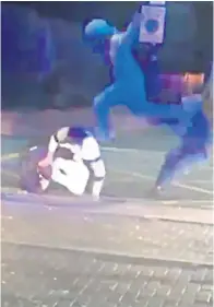  ??  ?? An attacker hauls a policeman to the floor, left, in footage of an attack in Merton, south London. As a female officer comes to his aid, a man in a hoodie turns to run, centre, before returning and kicking her to the floor, right
