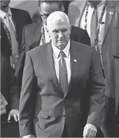  ?? ROBERT DEUTSCH, USA TODAY SPORTS ?? GOP vice presidenti­al nominee Gov. Mike Pence enters the convention hall during the 2016 Republican National Convention at Quicken Loans Arena.