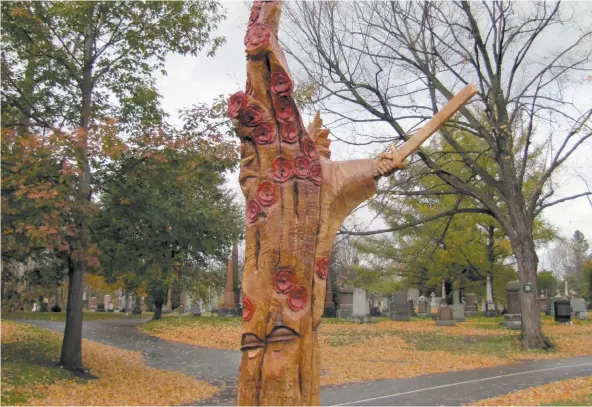  ?? PHOTOS SUPPLIED ?? Master woodcarver and chainsaw artist Peter Van Adrichem created the “Armistice Tree” for Beechwood Cemetery out of a century-old maple that was ready to be cut down.