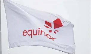  ?? REUTERS ?? An Equinor flag is pictured at the company’s headquarte­rs in Stavanger, Norway.
