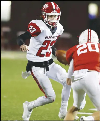  ?? Photo courtesy jaysphotod­esign.com ?? Glen Rose senior quarterbac­k Wesley Launius attempts to get by a Harding Academy defender in the Beavers 35-7 loss Friday in the 3A State Semifinals.