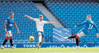  ??  ?? Ryan Kent, the subject of a Leeds United transfer bid, strokes home the second goal