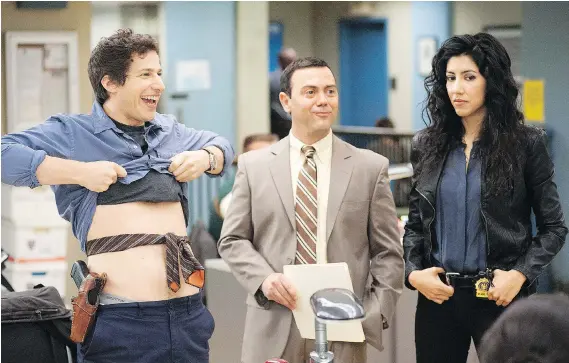  ?? FOX ?? Even Brooklyn Nine-Nine, a comedy series known for its diverse cast including Andy Samberg, left, Joe Lo Truglio and Stephanie Beatriz, trots out the hoary trope of the white male hero.