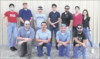  ?? ?? russell Gee and esteban Cook (top center) were embedded into the Instrument­ation division at Yuma proving Ground during their 10-week summer internship. (top, left to right) maria Villegas, steve taylor, russell Gee, esteban Cook, Jose rodriquez, Daniela Villegas, Yelitza Candelas (bottom, left to right) Lance Kerestes, Jacob Lopez, ruben Hernandez, Justin Warren (photo by Ana Henderson)