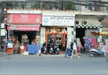  ?? PHA LINA ?? A row of shops along Sothearos Boulevard photograph­ed earlier this year in Phnom Penh.