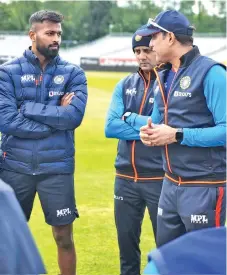  ?? ?? Captain Hardik Pandya and coach VVS Laxman at a training session