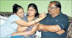  ?? HT PHOTO ?? Kuldeep Yadav’s sisters celebrate his hattrick against Australia at Eden Gardens with father Ram Singh at their home in Kanpur on Thursday.