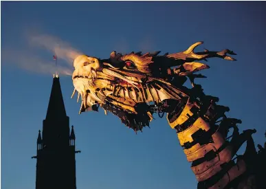  ?? JUSTIN TANG ?? Long Ma, the horse-dragon, passes Parliament Hill at a La Machine performanc­e that wowed thousands on the weekend.