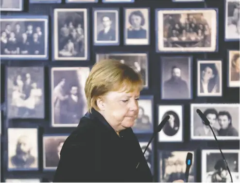  ?? Kacper Pempel/ REUTERS ?? German Chancellor Angela Merkel reacts during a tour on Friday of Auschwitz-birkenau, her first visit to the former Nazi German concentrat­ion and exterminat­ion camp near Oswiecim, Poland.