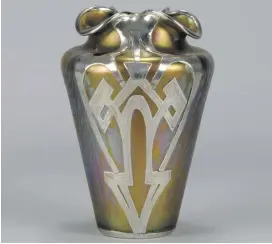  ??  ?? An early 20th century Medici Secessioni­st iridescent golden geometric glass vase 18cm high, c1910, £4,950