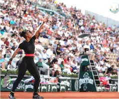  ??  ?? Serena Williams of the US serves to Germany’s Julia Goerges during their women’s singles third round match on day seven of The Roland Garros 2018 French Open tennis tournament in Paris. — AFP photo