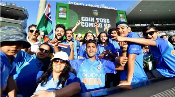  ??  ?? Indian supporters jubilating during the Australia against India T20 internatio­nal cricket match at Sydney Cricket Ground (SCG) in Sydney in this Nov 25 file photo. — AFP photo