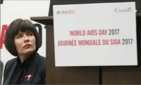  ?? ADRIAN WYLD, THE CANADIAN PRESS ?? Federal Minister of Health Ginette Petitpas Taylor listens to a speaker during an event marking World AIDS Day on Friday in Ottawa.