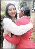  ?? PICTURE: MARILYN BERNARD ?? SOON TO SAY GOODBYE: Yvonne Iyer gives her bright star Nonhlanhla a hug.