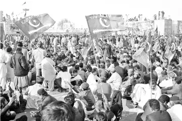  ??  ?? People gather near the shrine of Bhutto to mark her death anniversar­y in Garhi Khuda Bakhsh. — AFP photo