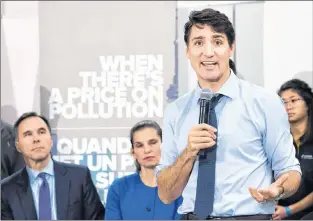  ?? CP PHOTO ?? Prime Minister Justin Trudeau speaks to the media and students at Humber College regarding his government’s new federally-imposed carbon tax in Toronto on Tuesday.