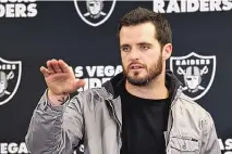  ?? DON WRIGHT/ASSOCIATED PRESS ?? Quarterbac­k Derek Carr, shown here at a news conference while with the Las Vegas Raiders, is headed for New Orleans after agreeing to a four-year contract believed to be worth up to $150 million.