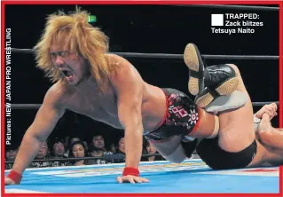  ??  ?? TRAPPED: Zack blitzes Tetsuya Naito