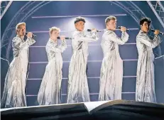  ?? FOTO: DPA ?? Das Musical „The Band“erzählt zwar nicht die Geschichte von Take That, wurde aber von der Gruppe entwickelt und bringt deren Hits auf die Bühne.
