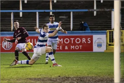  ??  ?? Jamie Walker scores his second goal of the game to double the advantage for Hearts at Cappielow