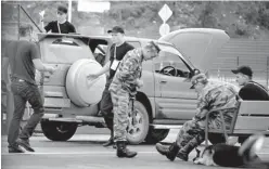  ??  ?? Russian security personnel check a vehicle at a check point in Vladivosto­k where the Asia-Pacific Economic Cooperatio­n (APEC) summit will take place. APEC leaders’ summit in Russia’s far eastern port city of Vladivosto­k will take place on September 8...