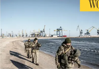  ?? MARTYN AIM / GETTY IMAGES ?? Soldiers with Ukraine’s border security force patrol the coast of the Azov Sea near the port of Mariupol on Thursday. U.S. President Donald Trump called off a meeting with Russian President Vladimir Putin at the G20 summit in Argentina because of Russia’s recent hostilitie­s with Ukraine.