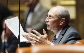  ?? AP file photo ?? Republican Rep. Merrill Nelson speaks during a special session at the Utah State Capitol, April 18, 2018, in Salt Lake City. Paul Adams, a member of the Mormon church, confessed he was abusing his daughter to his bishop, John Herrod, in 2010. In Arizona, clergy are among the profession­als required to report child sexual abuse to police or child welfare officials. But when the bishop called the church’s “help line” for advice, Nelson, a lawyer representi­ng the church, directed him to withhold the informatio­n from police and child welfare officials.