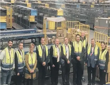  ??  ?? The Peterborou­gh Chamber of Commerce team visiting Amazon in Peterborou­gh