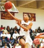  ?? STAFF PHOTO ?? Tyner’s Devante Jones shoots a layup against Livingston Academy in 2014.