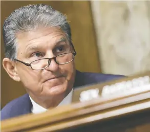  ?? KEVIN DIETSCH / GETTY IMAGES ?? U.S. Sen. Joe Manchin said he is promoting a North American plan that includes Canada and Mexico in a zone for a levy on imports from less carbon-sensitive nations.