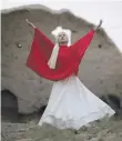  ??  ?? Fahima Mirzaie, 24, whirling at Rumi’s birthplace in Balkh