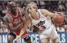  ?? ASSOCIATED PRESS FILE ?? Craig Ehlo — shown driving against Michael Jordan during the 1992 playoffs — will forever be known for his role in “The Shot.”