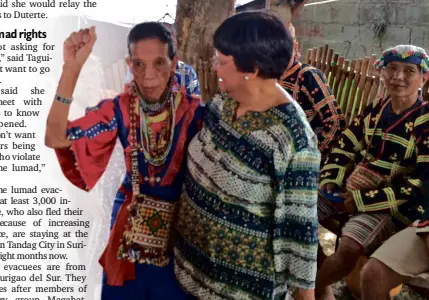  ?? NICO ALCONABA/INQUIRER MINDANAO ?? INCOMING Social Welfare Secretary Judy Taguiwalo (right, standing) meets Bai Bibyaon, the only woman leader of the Manobo tribe, on Wednesday. Taguiwalo visited the “lumad” evacuees who have been staying in a church compound in Davao City for more than...