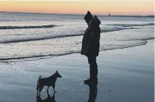  ??  ?? Kelly Amanda Thompson: Enjoying a walk together at Seaburn.