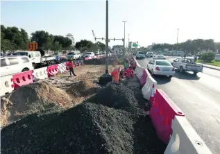  ?? Jeffrey E Biteng / The National ?? A University of Sharjah study on the dangers at roadworks highlighte­d the need for strict enforcemen­t of traffic safety measures and clearer signs through affected areas.