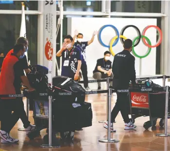  ?? KAZUHIRO NOGI / AFP VIA GETTY IMAGES ?? The Olympics bring attention to political and social issues that often fly under the radar, argues Sabrina Maddeaux.