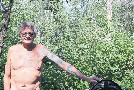  ?? KEVIN MAIMANN/STARMETRO EDMONTON ?? If you want to rent a cabin at Helios Nudist Associatio­n, you’ll talk to longtime member Leo Desnoyers, who is in charge of membership and bookings.